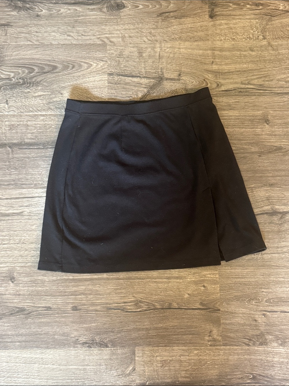 Classic Black Mini Skirt with Subtle Side Slit